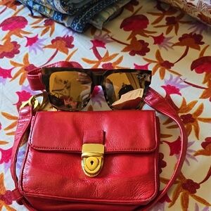 Red Leather Crossbody Bag with Sunglasses